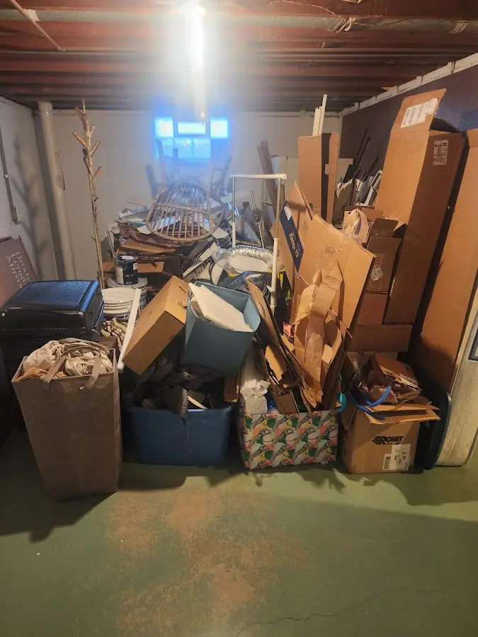 Roll-off dumpster container at job site for 2 Yard Dumpster Rental in Kings Point